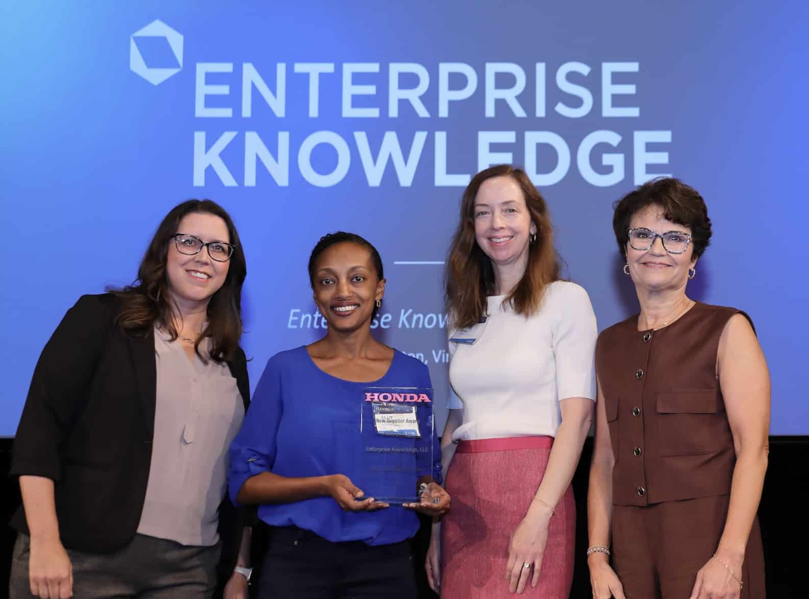 Lulit Tesfaye and Kristin Levitas accept award for outstanding performance as a Honda New Supplier